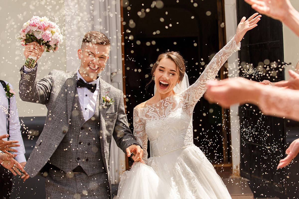 100+ Wedding Recessional Songs to Exit The Ceremony